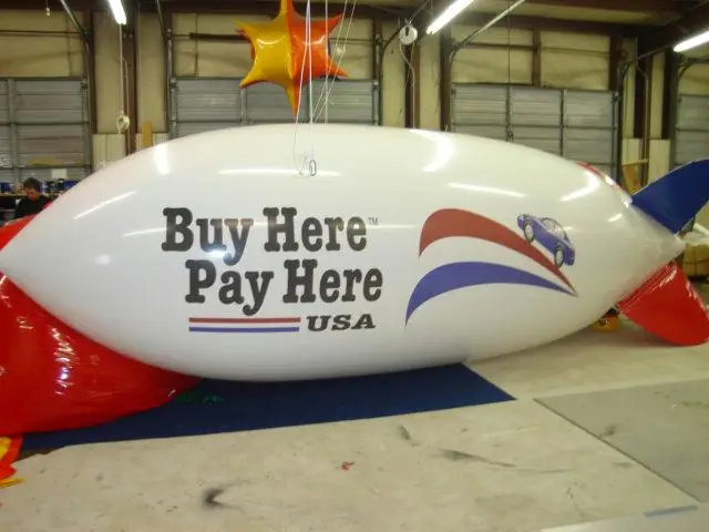 How Large Helium Balloons Advertising Captivates Crowds and Boosts Brands