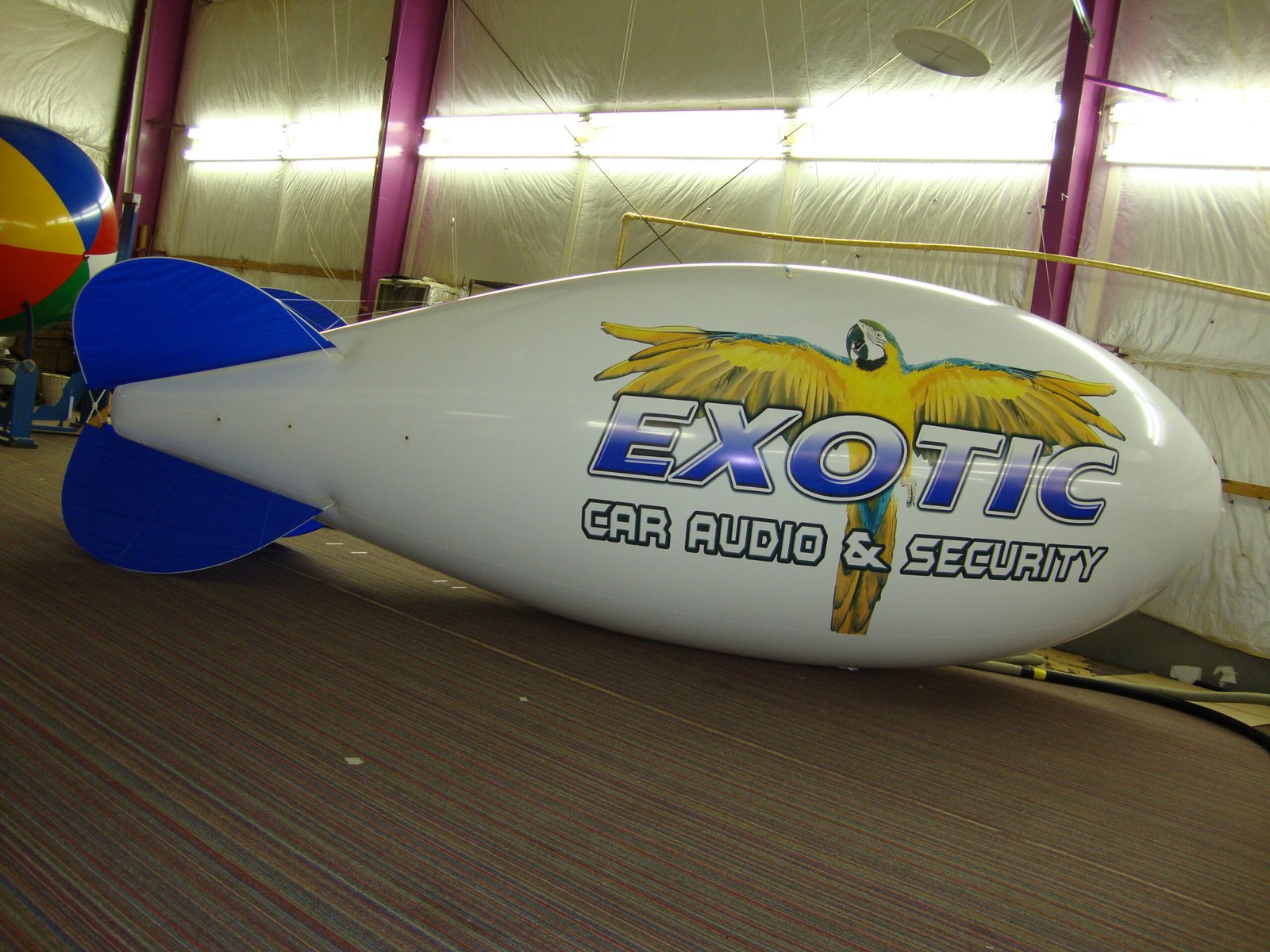 21-foot custom branded helium blimp used for an exotic retail promotion